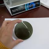 Muestra de lente oscuro de Óptica S.O.S